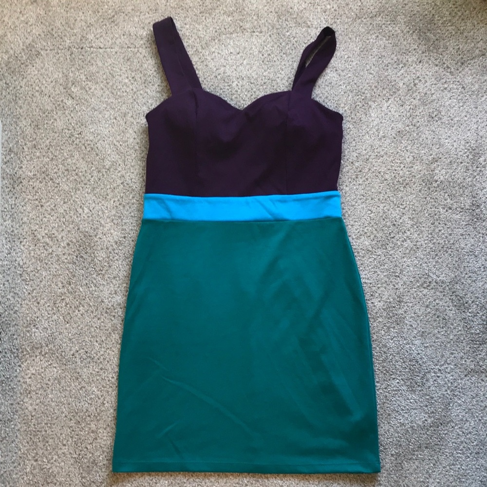 Sexy form fitting dress with unique back